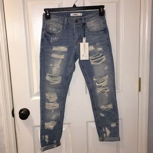 Brand new woman’s size 25 boyfriend style jeans